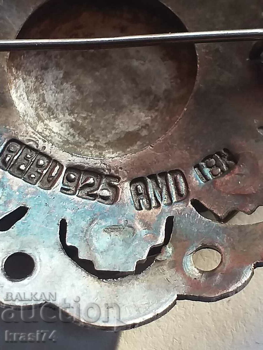 Auction Silver brooch with gold elements Auction Silver brooch with gold elements