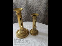 Two bronze candlesticks with lifter