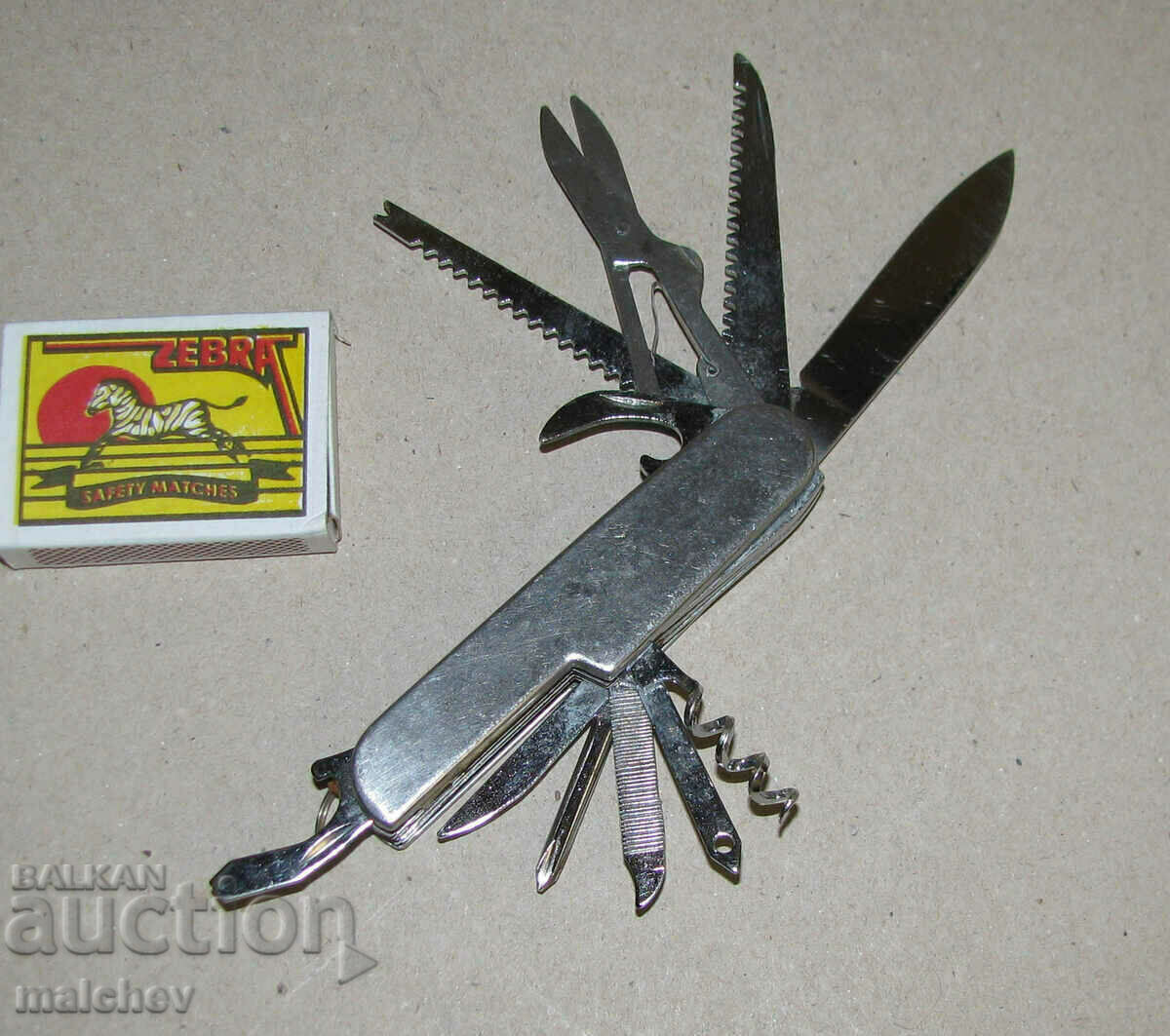Combination tool folding 11 tips, preserved