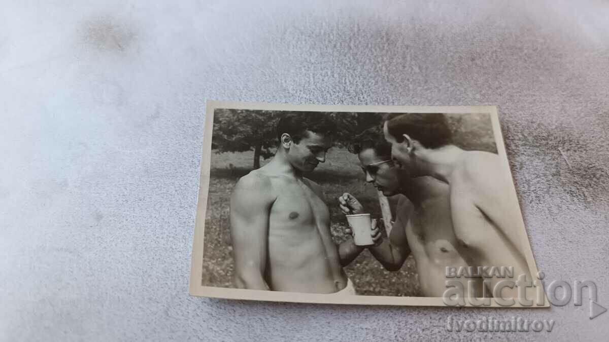 Photo Three young men naked to the waist