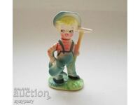Old porcelain figurine boy gardener FOREIGN