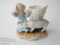 Old porcelain figure figurine and vase girl with pig
