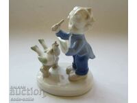 Old porcelain statuette figure "Boy Conductor" porcelain