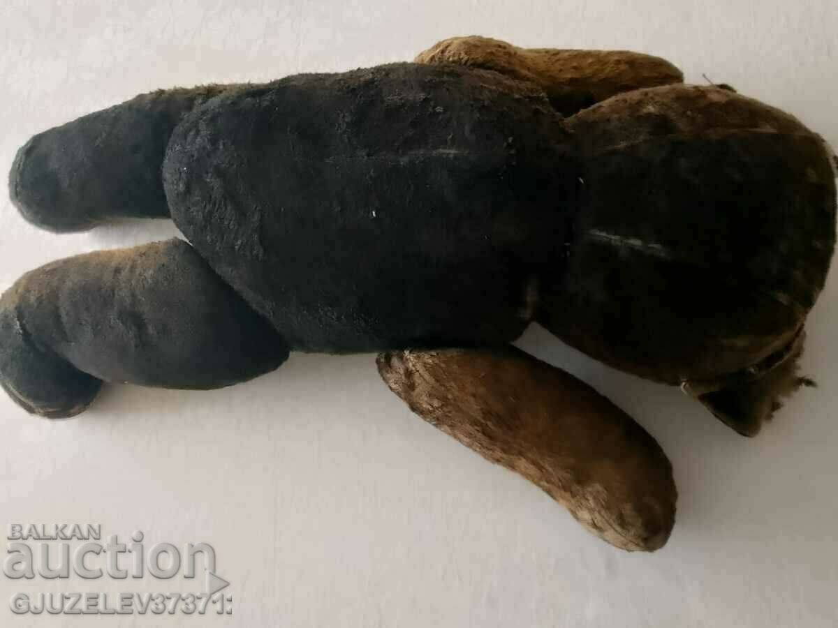 Delivery of Old teddy bear stuffed with straw Delivery of Old teddy bear stuffed with straw