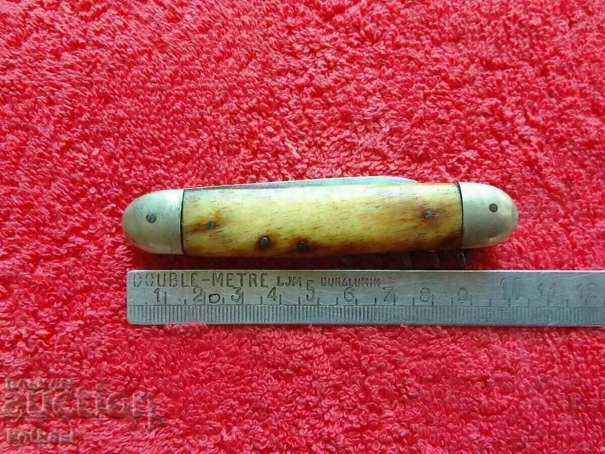 Auction Old pocket knife made of bone Auction Old pocket knife made of bone