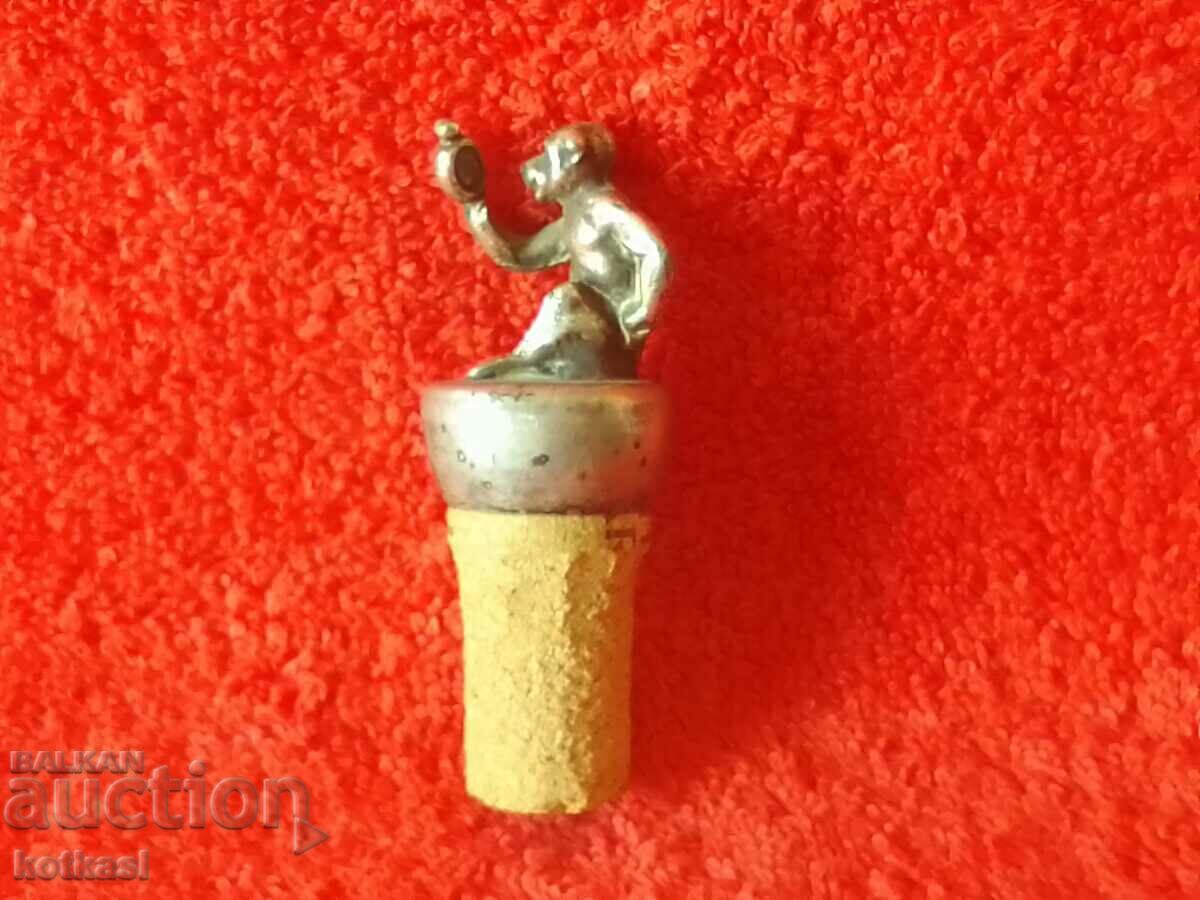 Bottle cap with a metal figure of a Monkey Bottle cap with a metal figure of a Monkey
