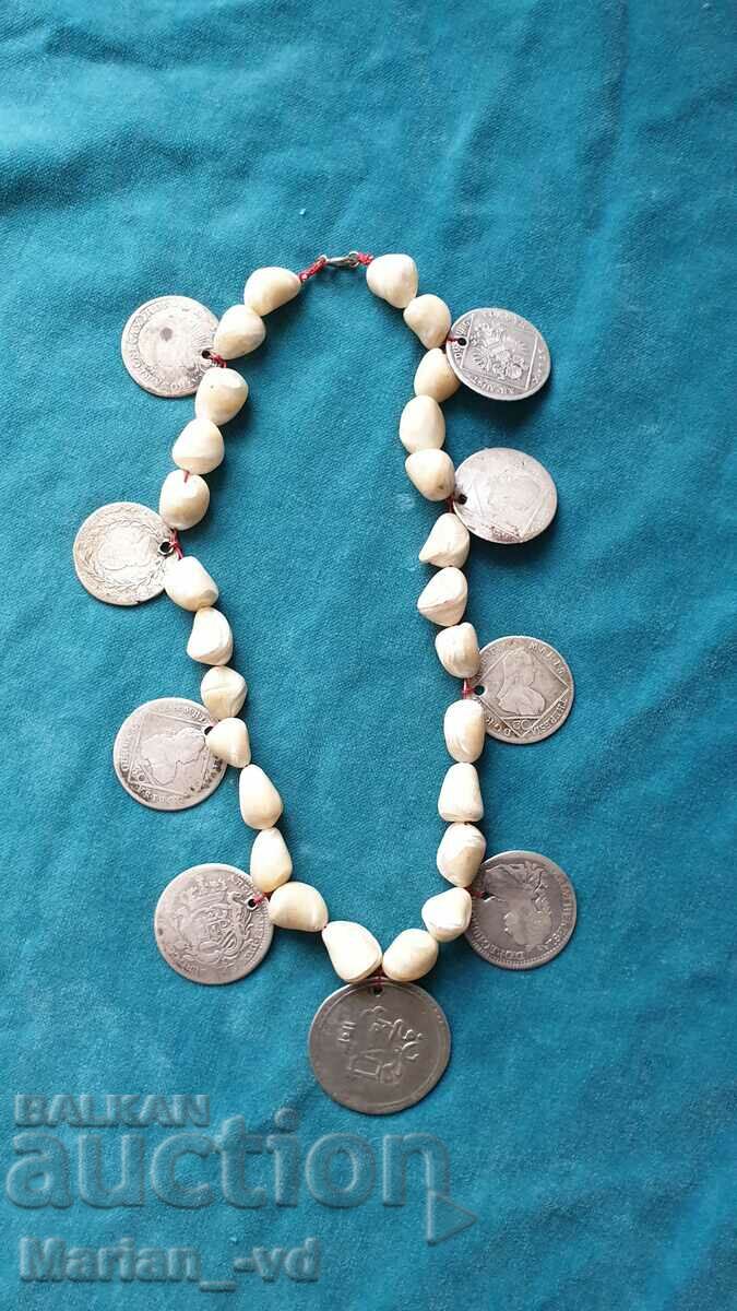 Old mother of pearl rosary with silver coins with price 250.00 BGN | € 127.82