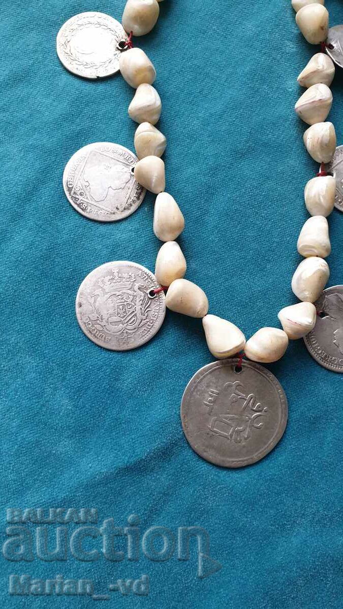 Auction  Old mother of pearl rosary with silver coins