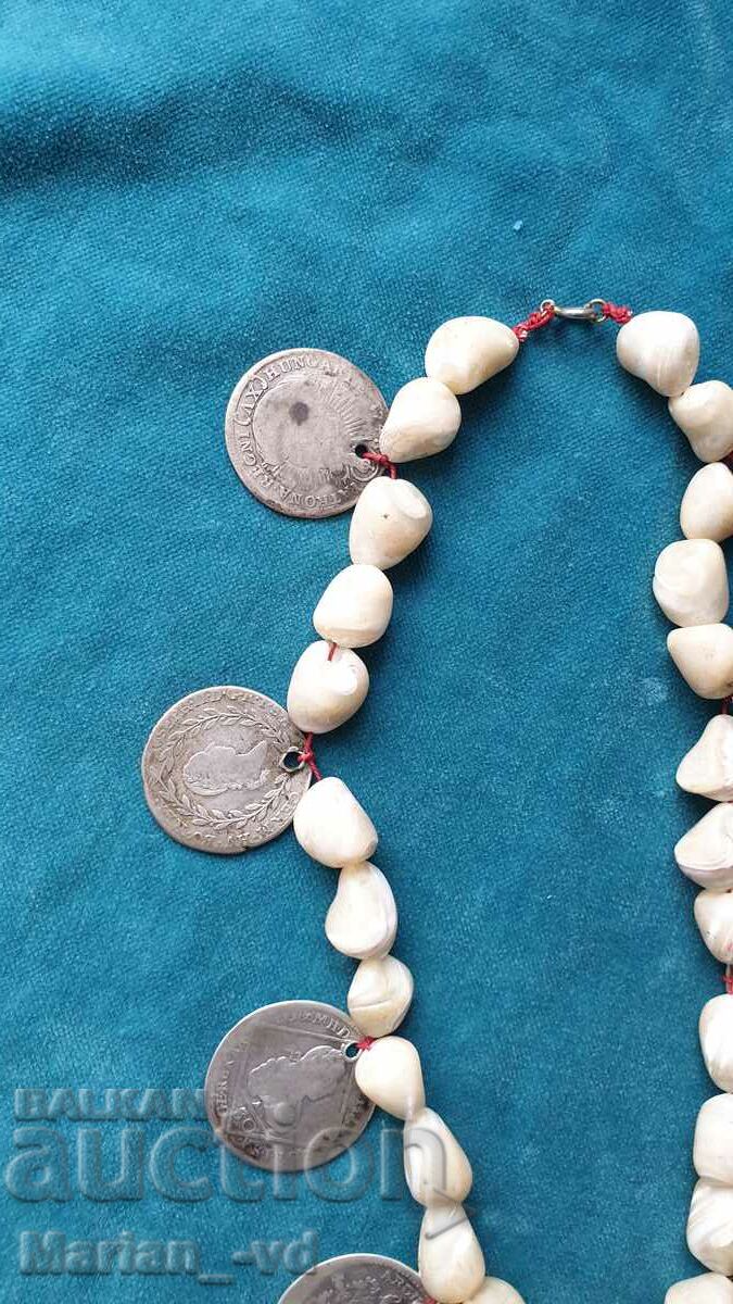 Delivery of Old mother of pearl rosary with silver coins