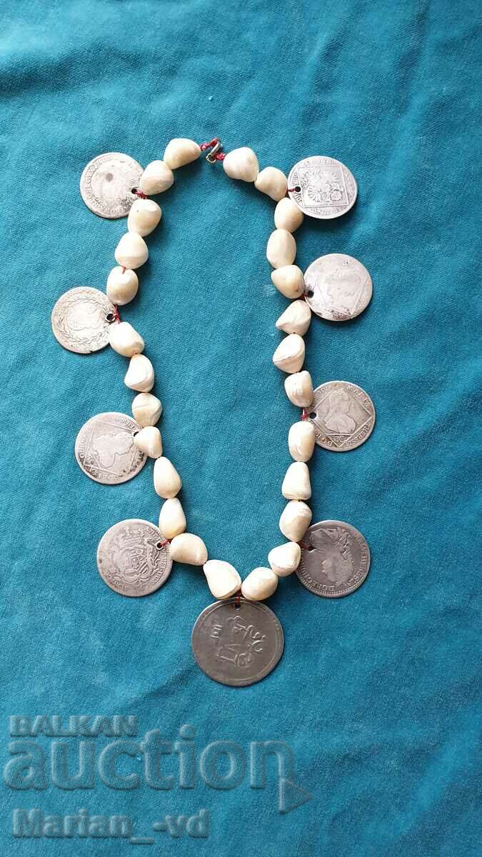 Old mother of pearl rosary with silver coins