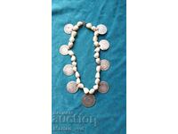 Old mother of pearl rosary with silver coins