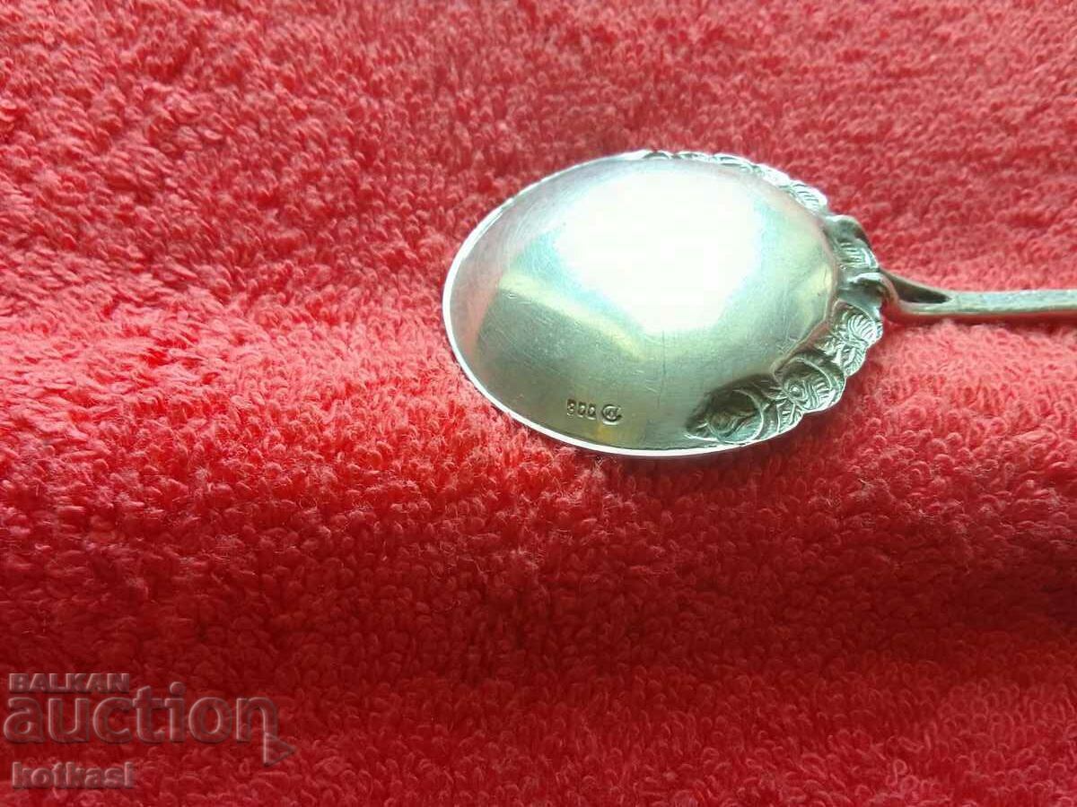 Delivery of Old beautiful silver 800 spoon marked roses