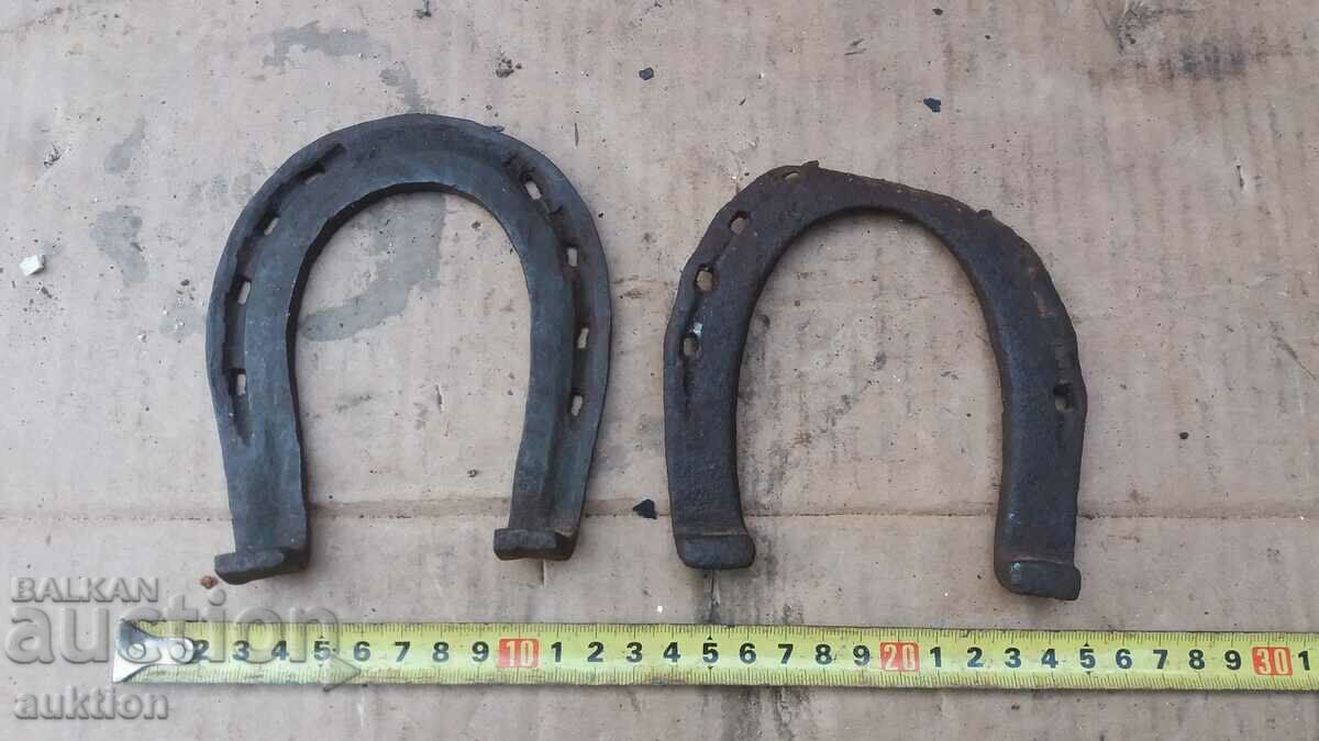 Auction LOT OF TWO WROUGHT HORSESHOES Auction LOT OF TWO WROUGHT HORSESHOES