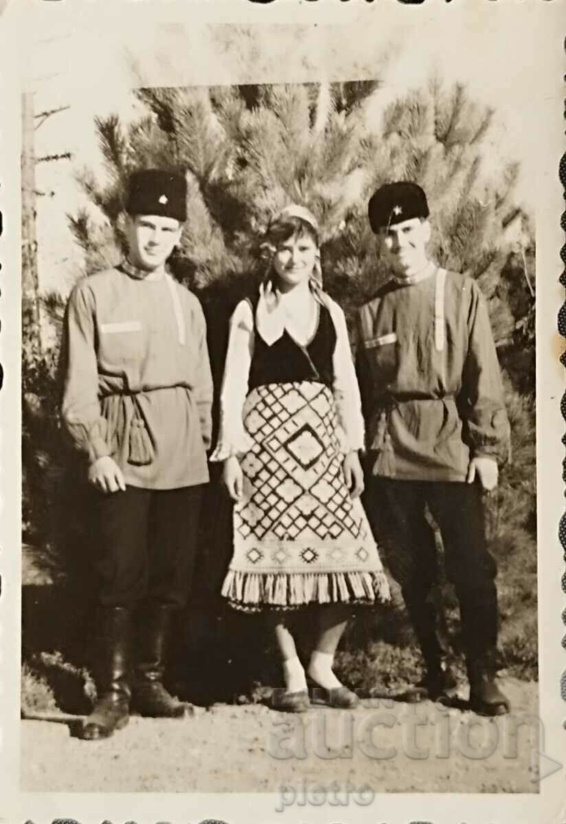 Bulgaria. Old photo photograph of two young men and a maiden..