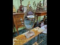 A wonderful antique bronze English mirror