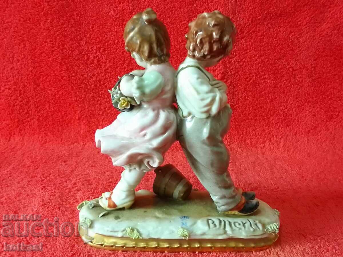 Auction Old porcelain figure Children Boy and Girl author Capadimonte Auction Old porcelain figure Children Boy and Girl author Capadimonte