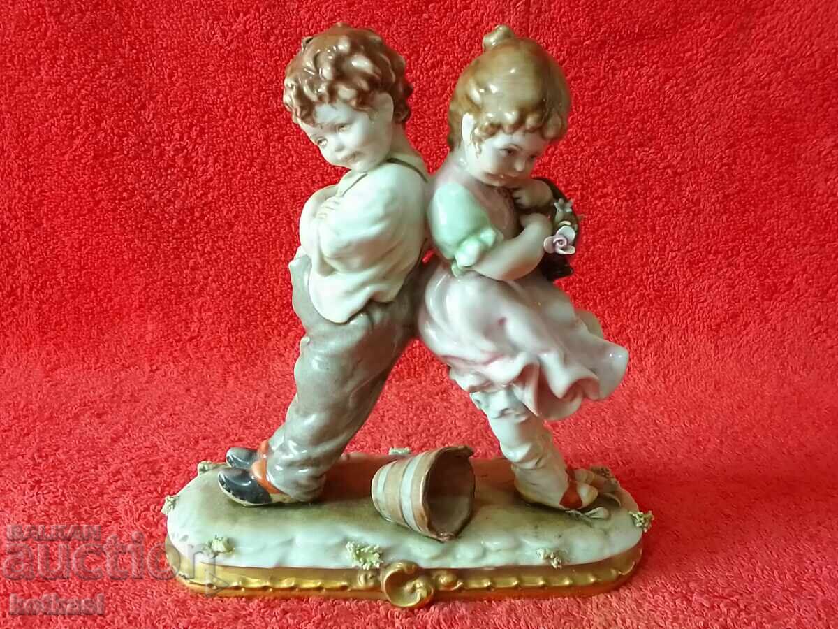 Old porcelain figure Children Boy and Girl author Capadimonte Old porcelain figure Children Boy and Girl author Capadimonte