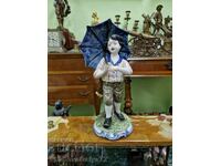 A superb antique Italian Capodim porcelain figure