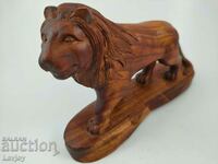 Wood carving figurine Lion