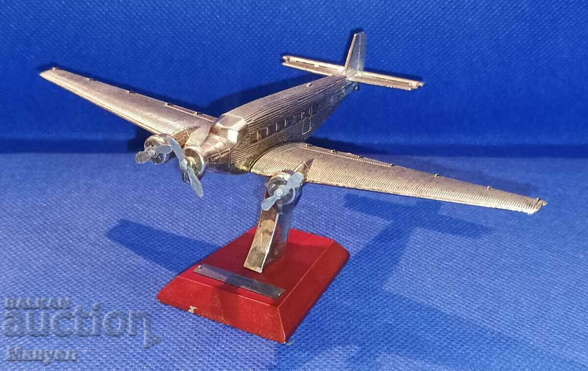 Metal model of Ju-52 aircraft.