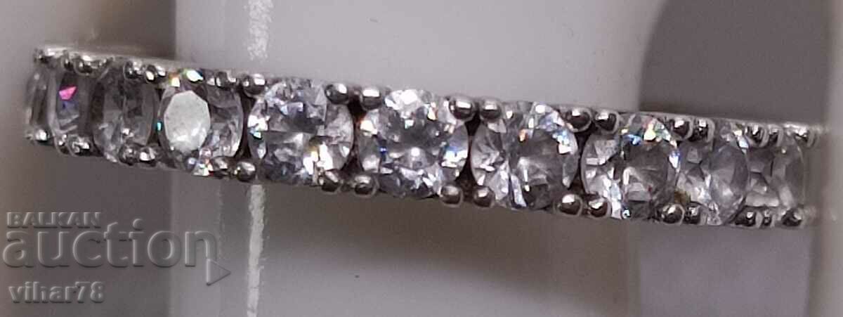 Auction Silver ring with zircons Auction Silver ring with zircons