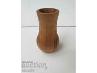 A wooden vase