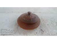 Wooden carved container with lid