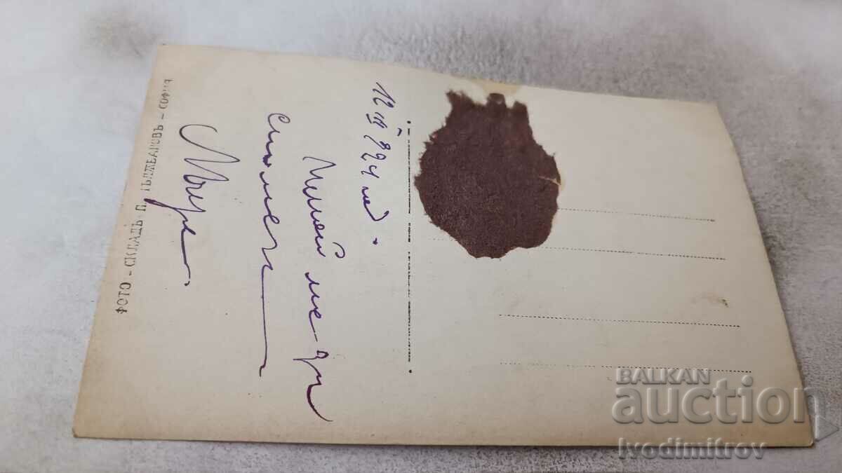 Photo Young girl sitting on a wooden bench in the park 1924 with price 2.35 BGN | € 1.20 Photo Young girl sitting on a wooden bench in the park 1924 with price 2.35 BGN | € 1.20