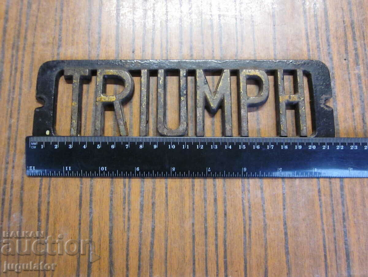 Auction vintage cast iron emblem plate TRIUMPH Auction vintage cast iron emblem plate TRIUMPH