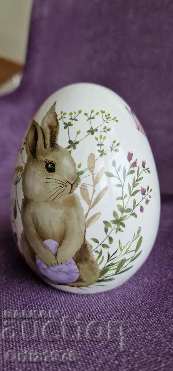 Auction  Large porcelain Easter egg.