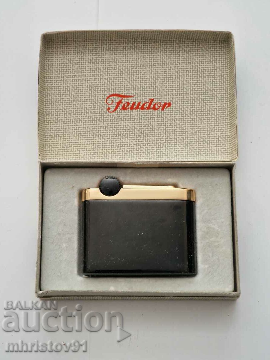 Vintage black enameled gold lighter "FEUDOR VEGA