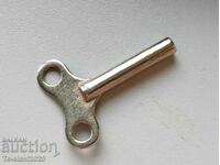 Old mechanical toy key