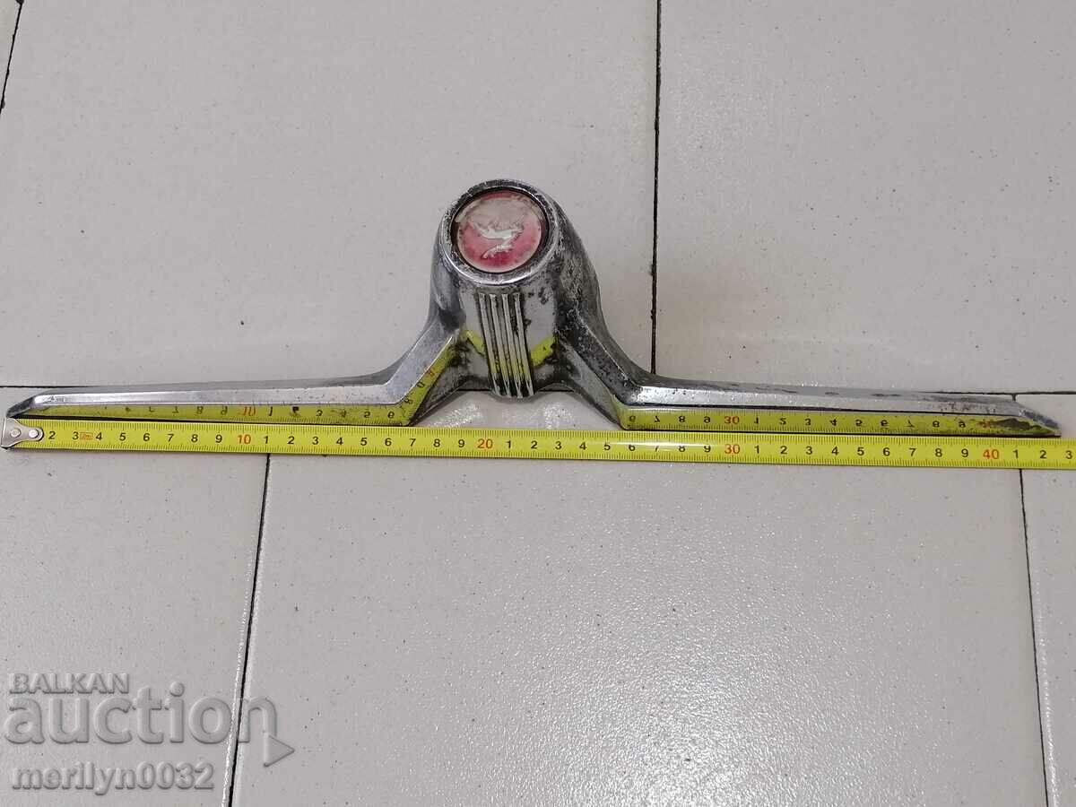 Delivery of The winged emblem from the hood of a VOLGA Gas car