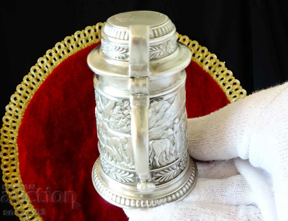 Delivery of Pewter mug with three village paintings. Delivery of Pewter mug with three village paintings.