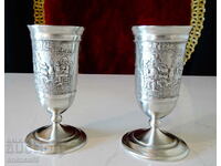 Two glasses on a stool for brandy, pewter.