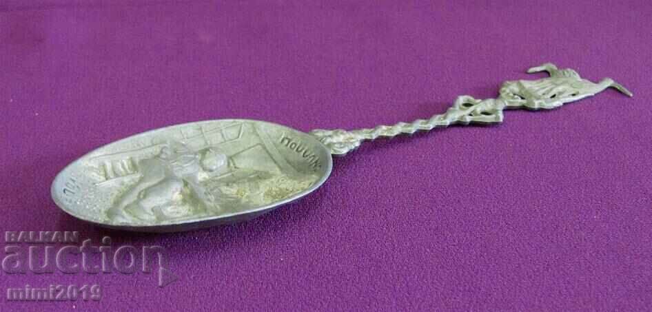 Delivery of 19th Century Metal Spoon Richly Decorated Delivery of 19th Century Metal Spoon Richly Decorated