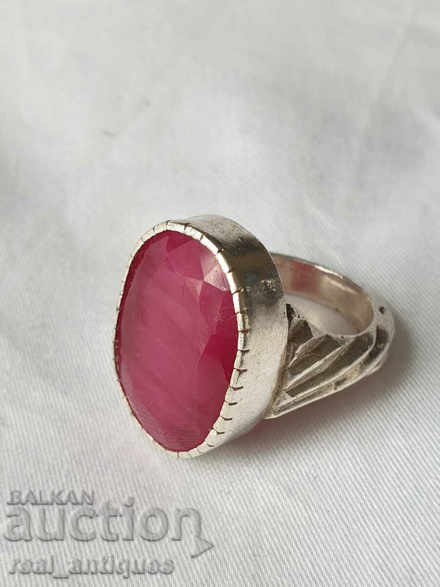 Silver ring with a natural ruby