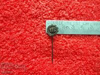 Old social metal badge pin NTS Small version