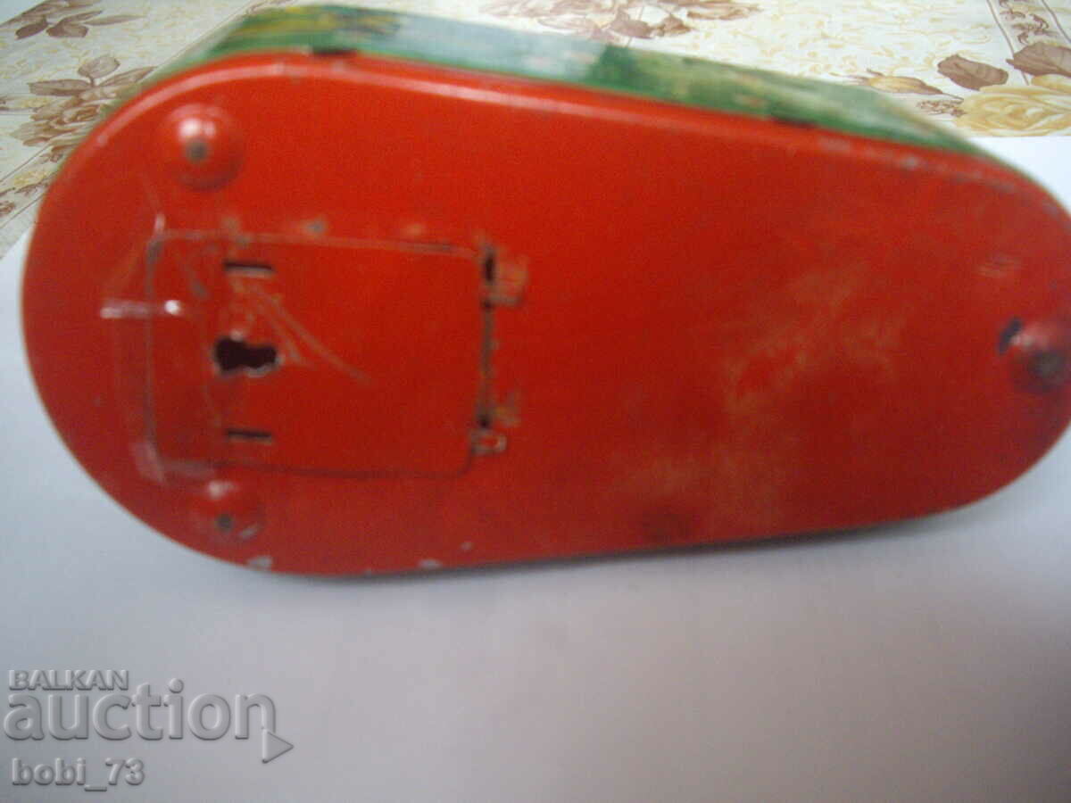 Auction Old Russian tin toy money box. Auction Old Russian tin toy money box.