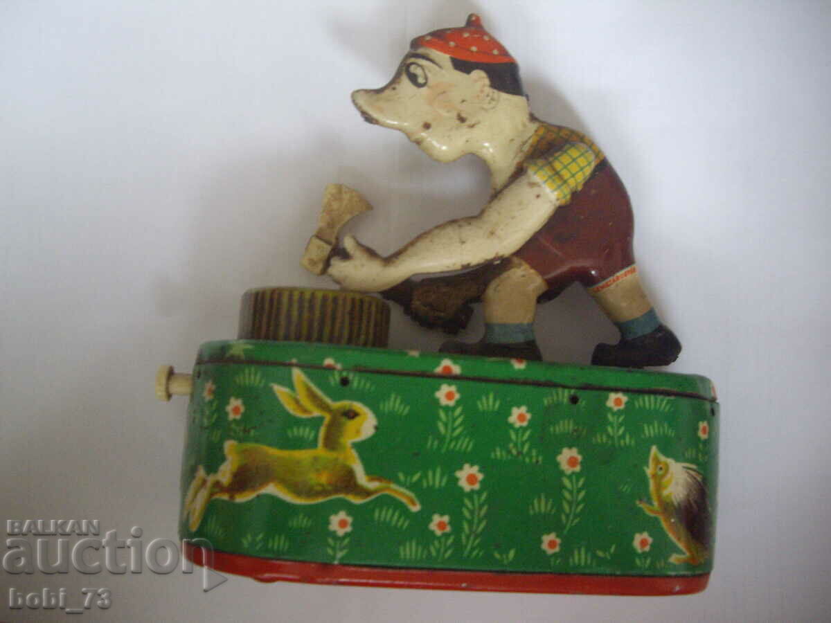 Old Russian tin toy money box.