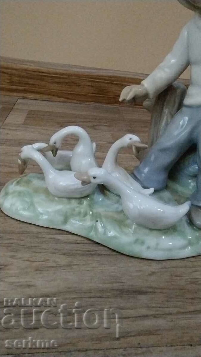 Auction Porcelain figure marked Auction Porcelain figure marked