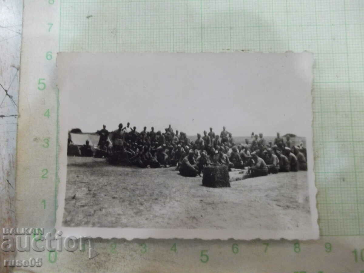 Old photo of a group of soldiers on vacation