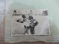Old photo of a couple in the snow in Frog Swamp Park