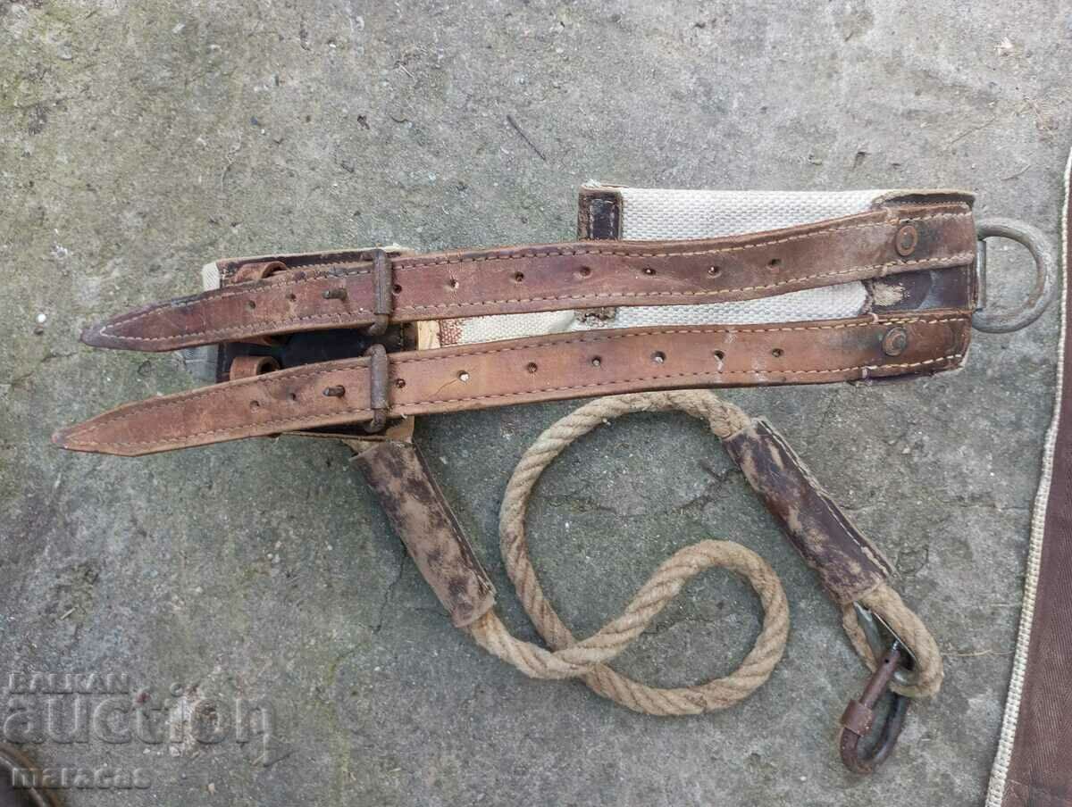 Auction  Leather harness for climbers and metal hook