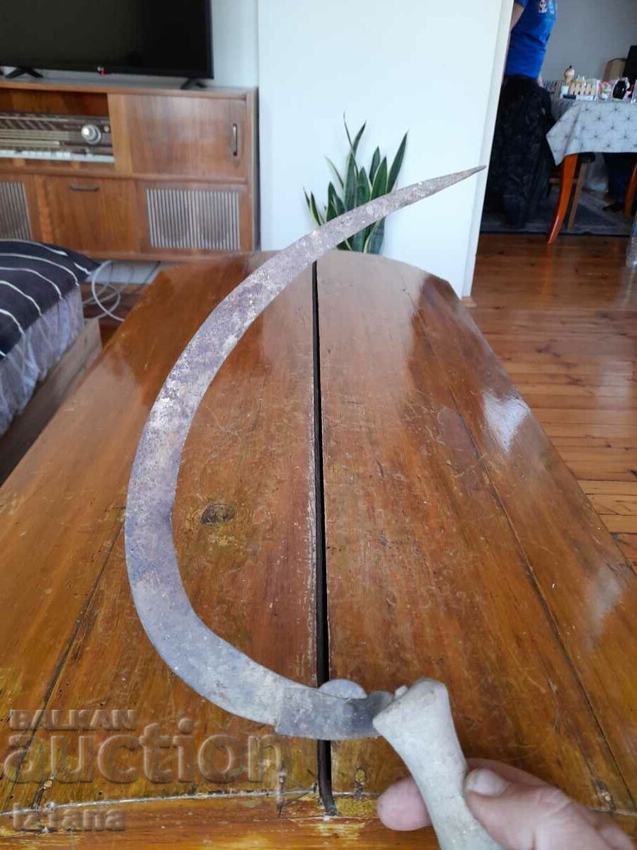 Old sickle with price 11.00 BGN | € 5.62 Old sickle with price 11.00 BGN | € 5.62