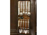 A set of spoons, forks, knives