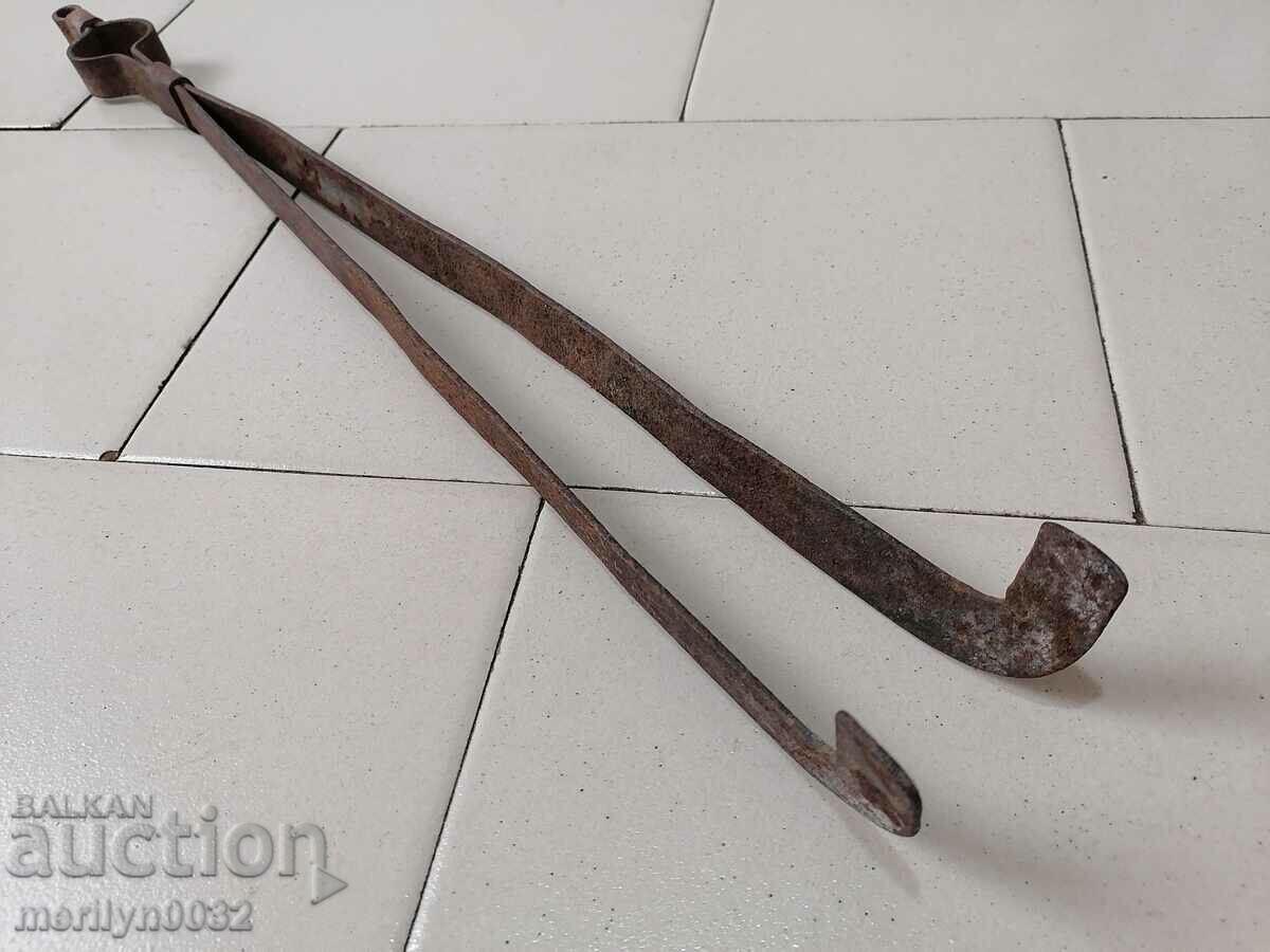 Old wrought dilaf, tongs, wrought iron