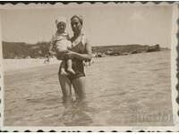Bulgaria Photo photograph of a young woman with her little...
