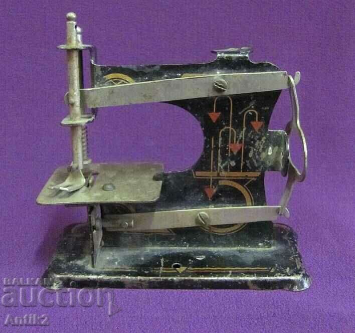 Antique Metal Children's Toy - Sewing Machine with price 80.00 BGN | € 40.90 Antique Metal Children's Toy - Sewing Machine with price 80.00 BGN | € 40.90