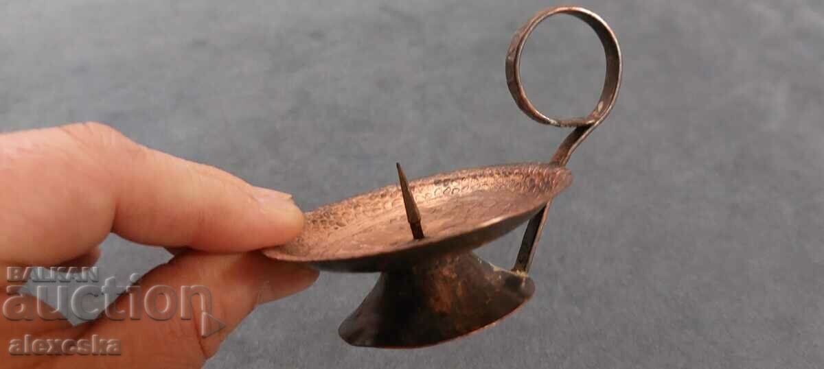 Old copper candle holder